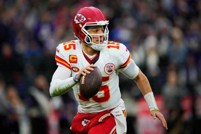 Kansas City Chiefs quarterback Patrick Mahomes (15) looks to pass during the first half of...