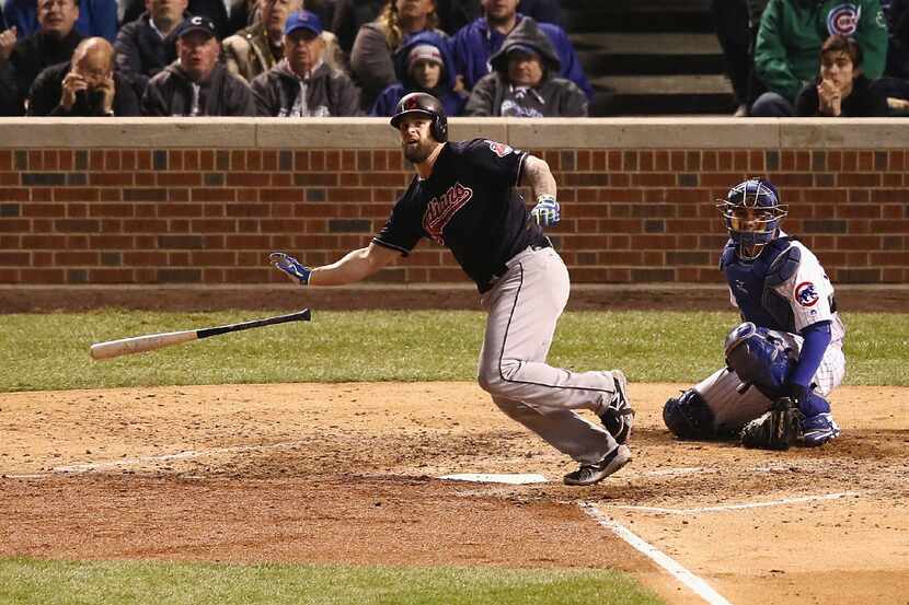 CHICAGO, IL - OCTOBER 30:  Mike Napoli #26 of the Cleveland Indians hits a single in the...