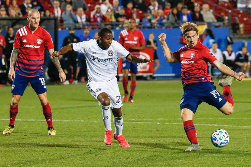 FC Dallas midfielder Paxton Pomykal (19) scores during the second half of an MLS soccer...