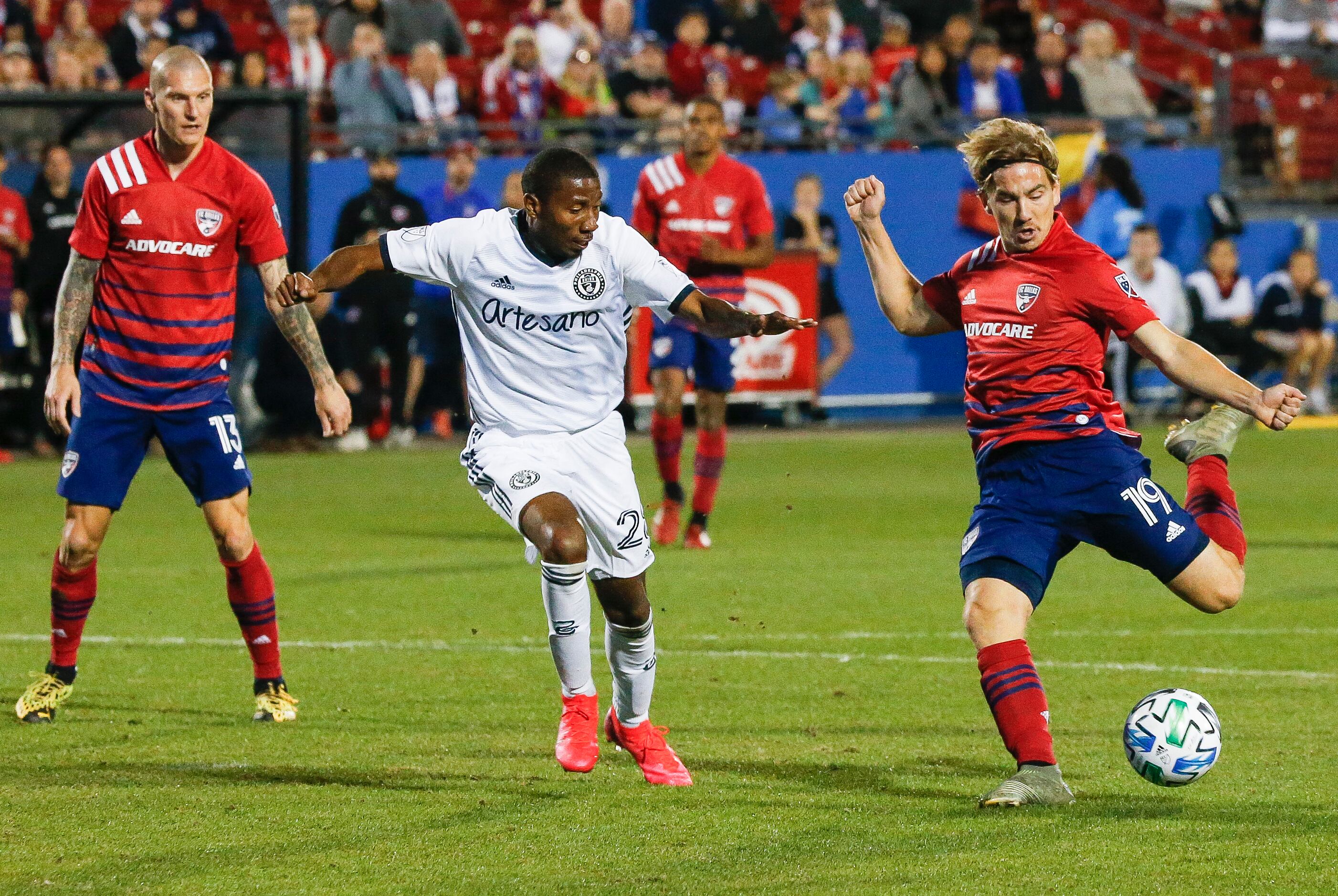 FC Dallas midfielder Paxton Pomykal (19) scores during the second half of an MLS soccer...