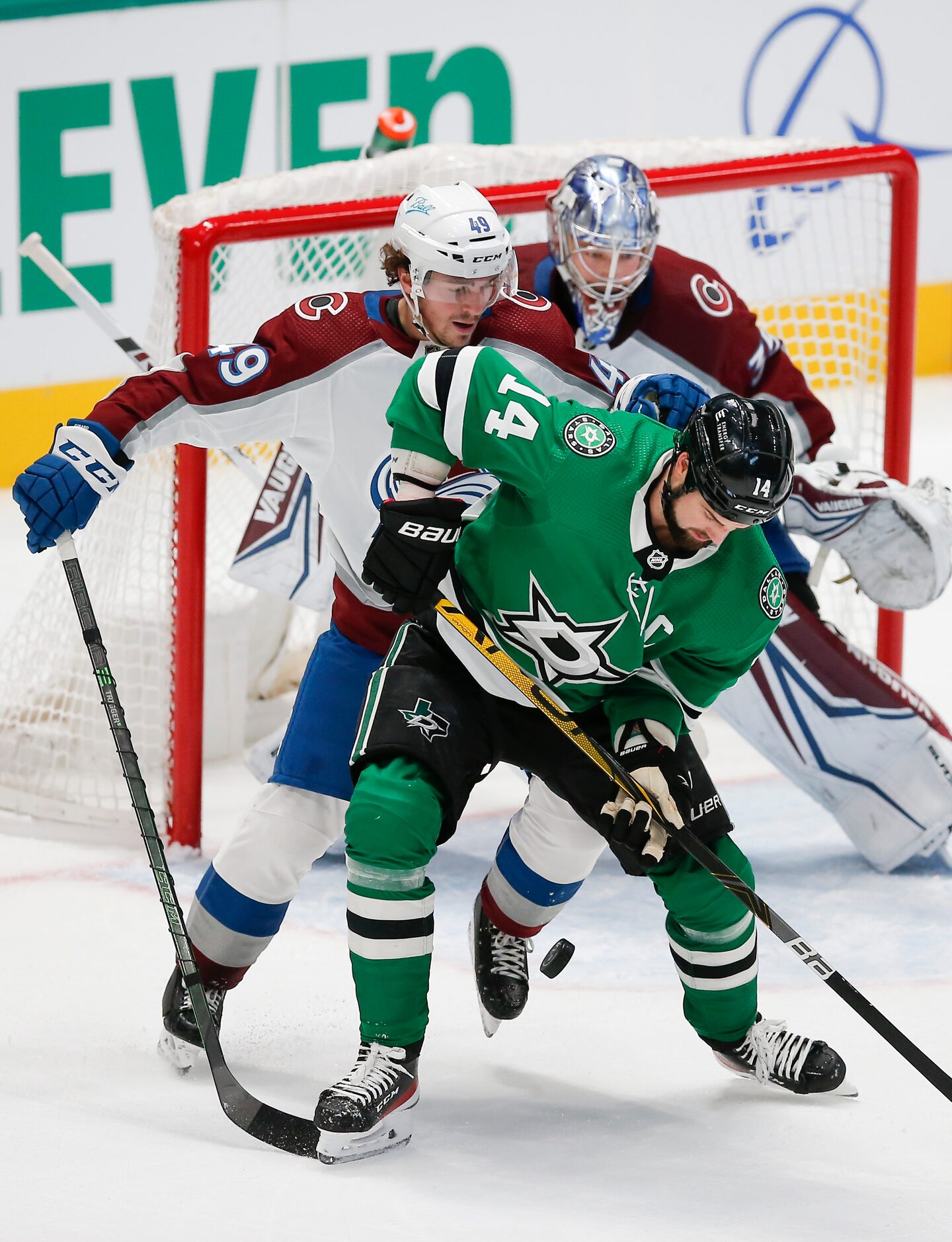 Dallas Stars forward Jamie Benn (14) battles Colorado Avalanche defenseman Samuel Girard...