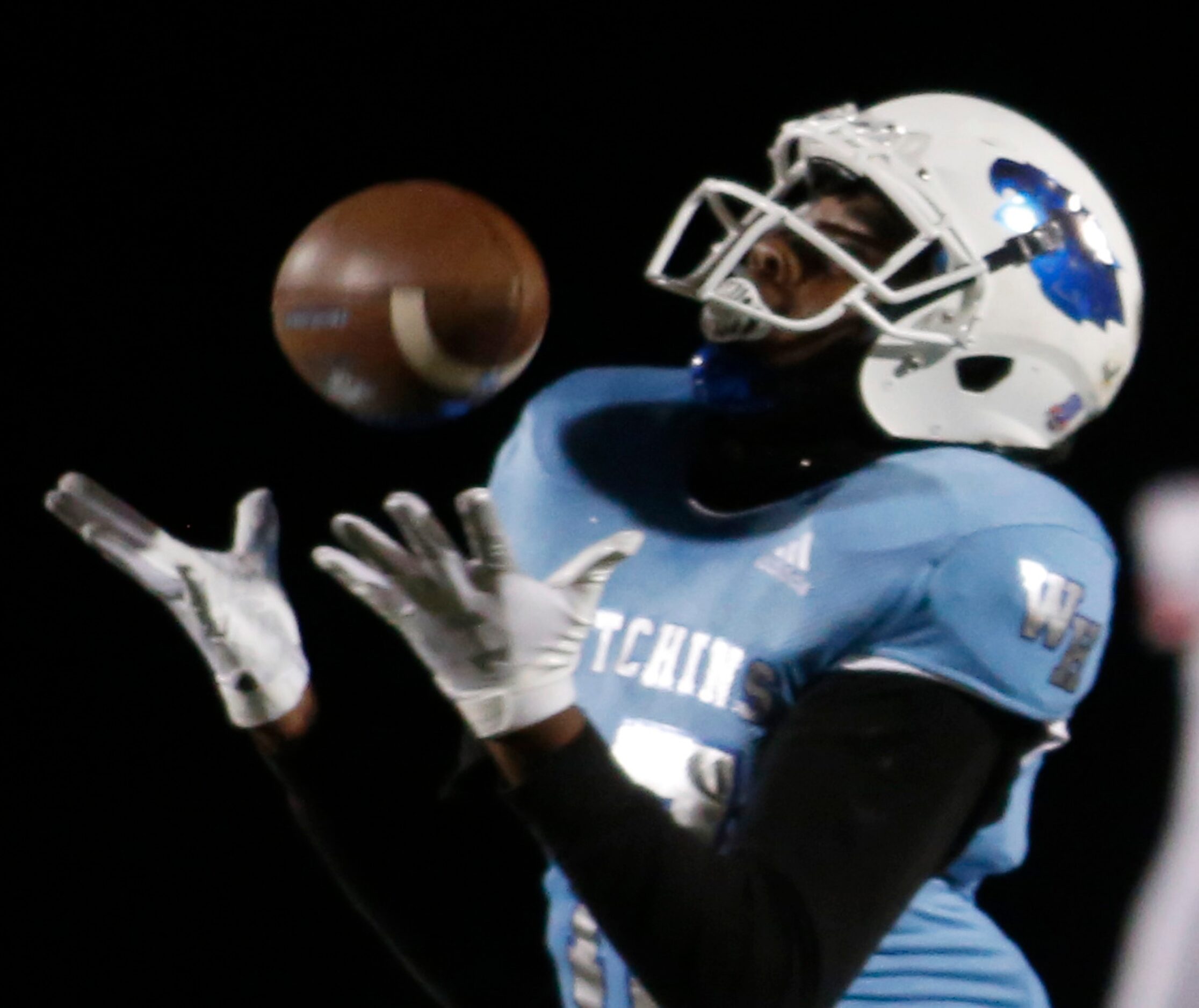 Wilmer Hutchins tight end Jarvis Turner (17) eyes in a second quarter reception in their...