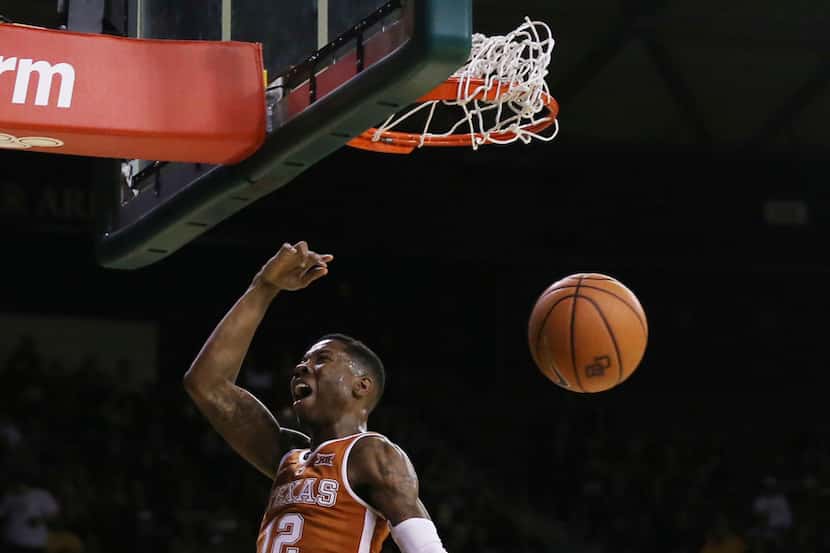 Texas guard Kerwin Roach II reacts after scoring over Baylor in the first half of an NCAA...