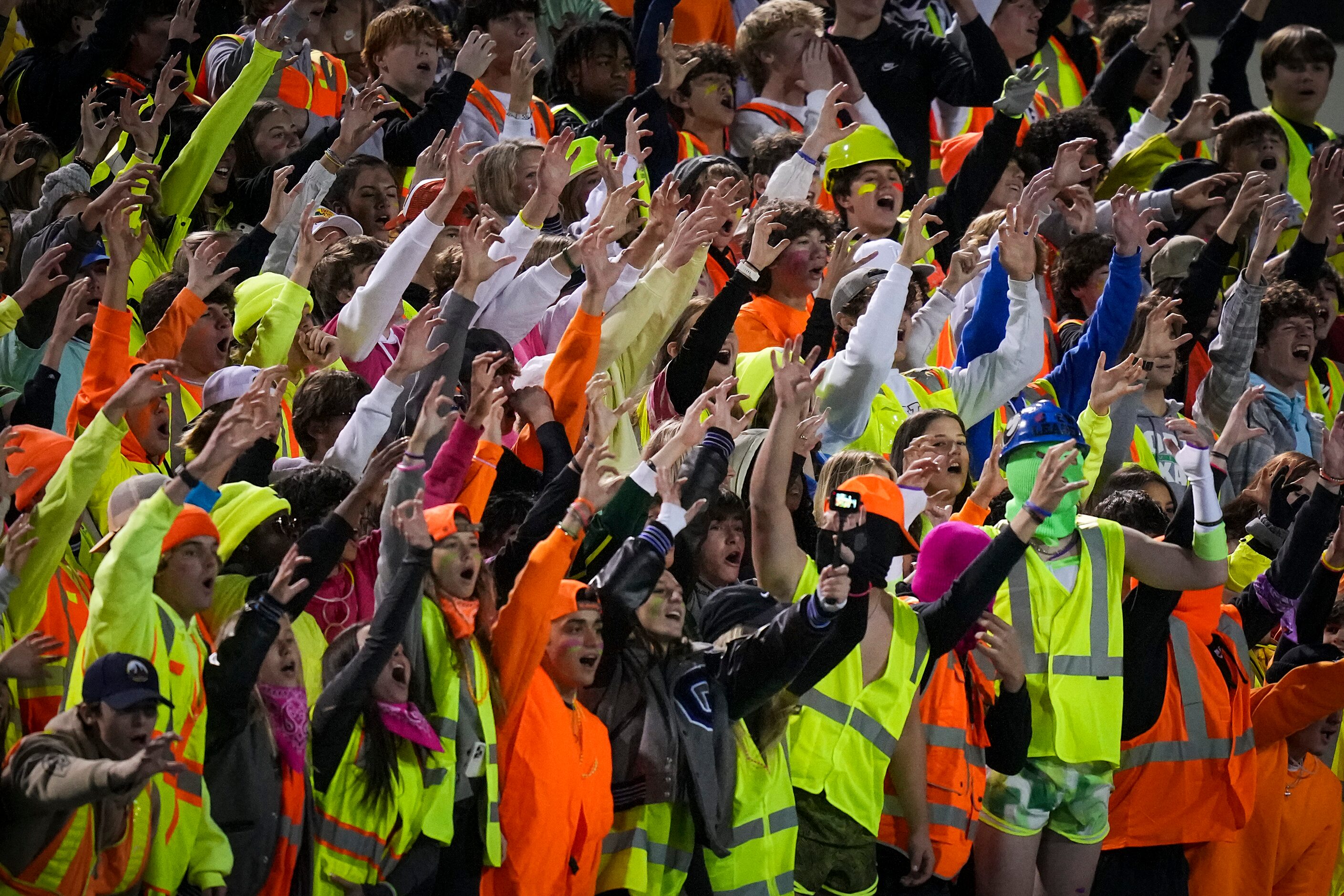 Denton Guyer fans cheer their team during the first half of a Class 6A Division II...