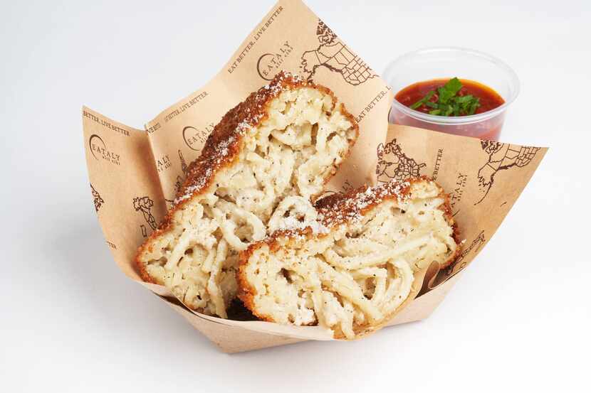 You know you wanted to see fried cacio e pepe, Eataly's first concessions item to hit the...