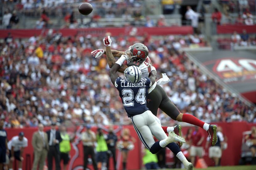 Dallas Cowboys cornerback Morris Claiborne (24) knocks away a pass Tampa Bay Buccaneers wide...