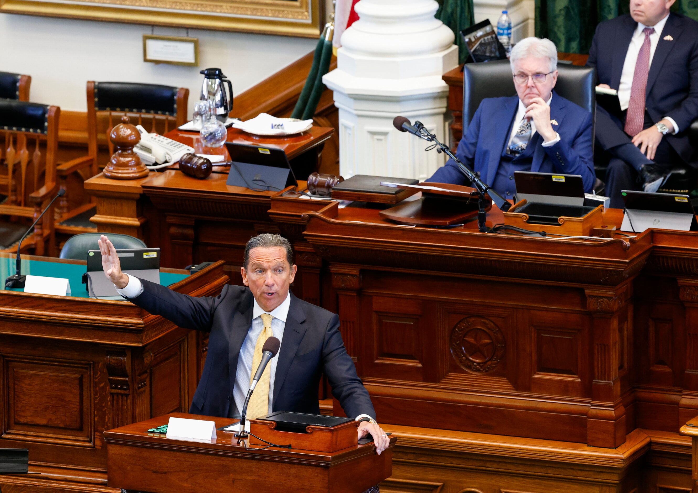 Attorney Tony Buzbee (left) delivers opening statements for the defense as Lt. Gov. Dan...