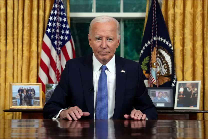 President Joe Biden pauses as he concludes his address to the nation from the Oval Office of...