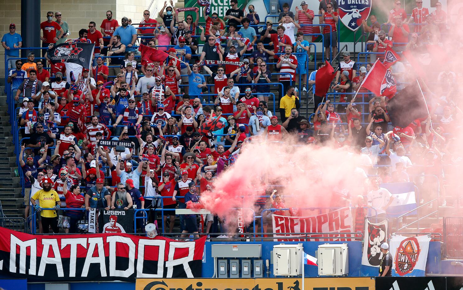 Fans react to a goal during the first half as FC Dallas hosted the Houston Dynamo at Toyota...