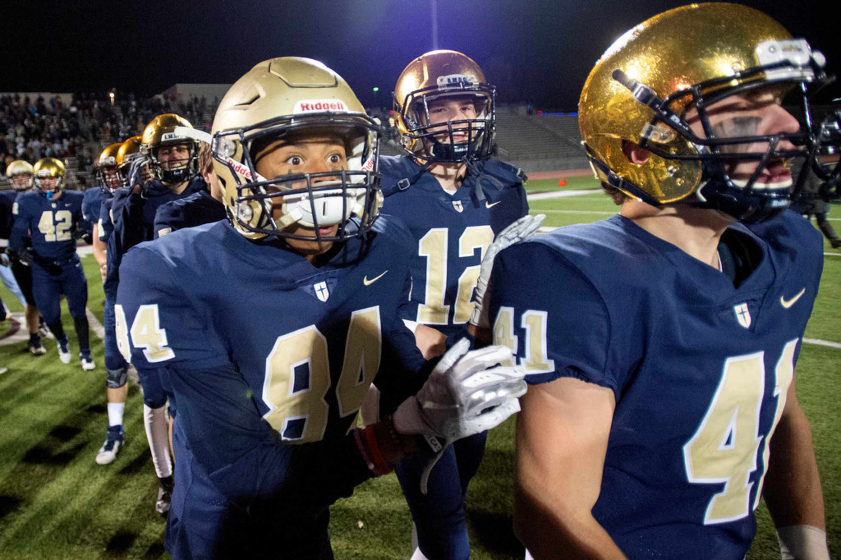 Jesuit sophomore wide receiver Ford Butler (84) is wide-eyed after his team defeated...