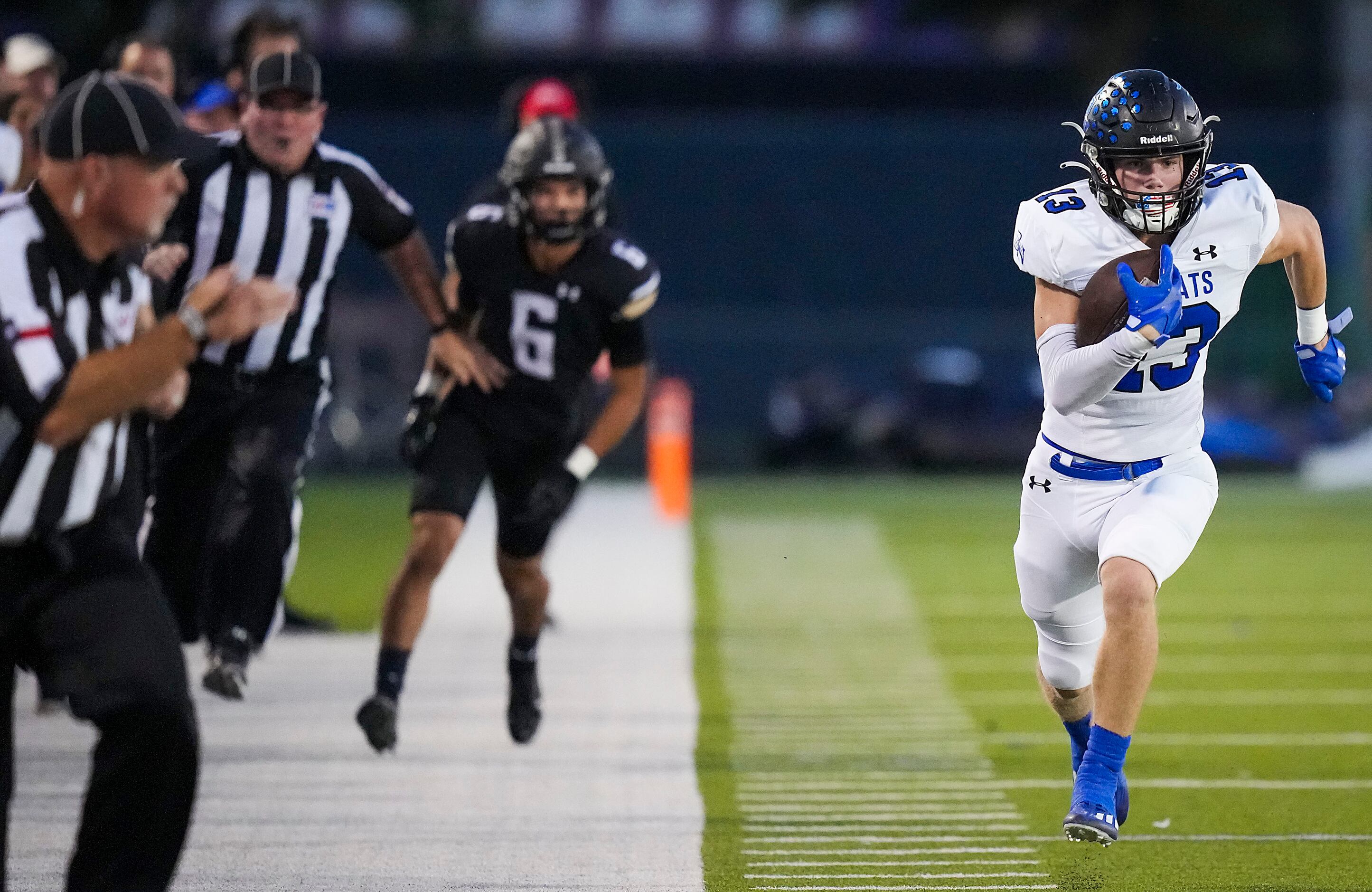 Trophy Club Byron Nelson wide receiver Gavin McCurley (13) races down the sidelines on a...