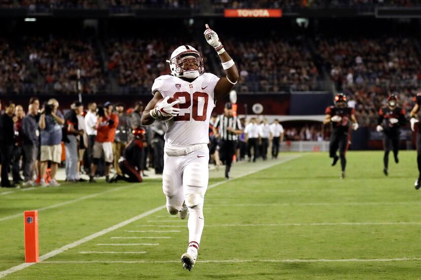 FILE - In this Sept. 16, 2017, file photo, Stanford running back Bryce Love scores a...