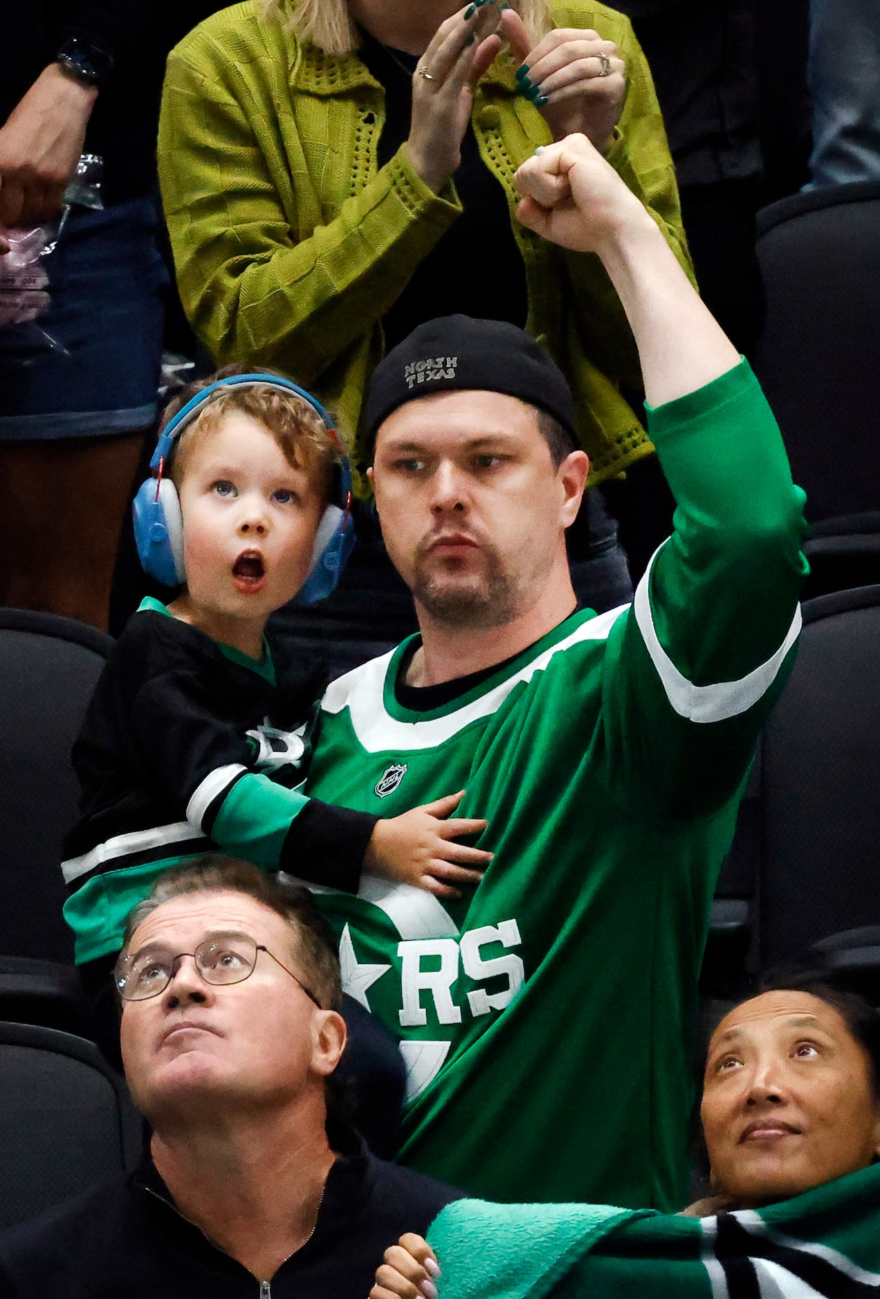 Dallas Stars fans cheer a second period goal against the Edmonton Oilers at the American...