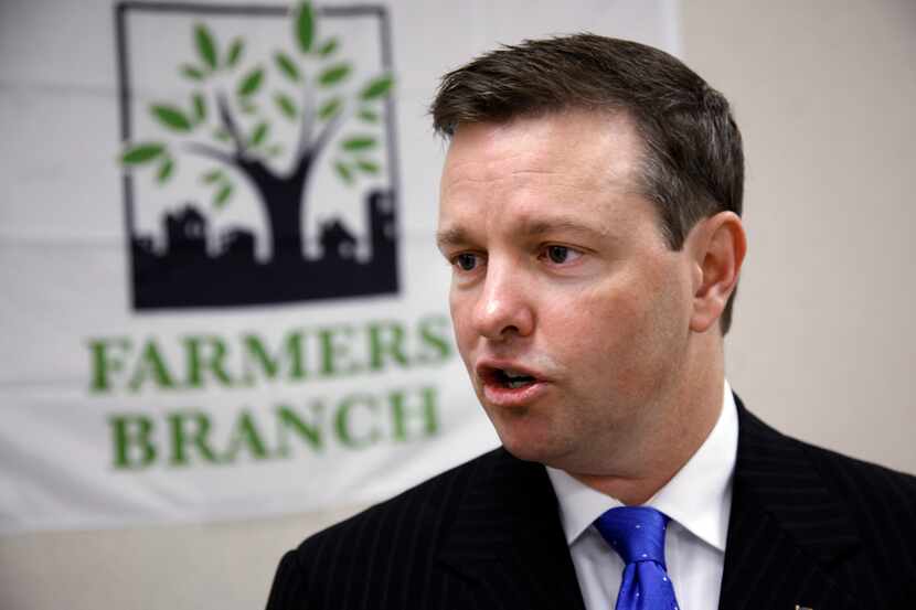 In this file photo from 2011, Farmers Branch Mayor Tim O'Hare answers questions after...