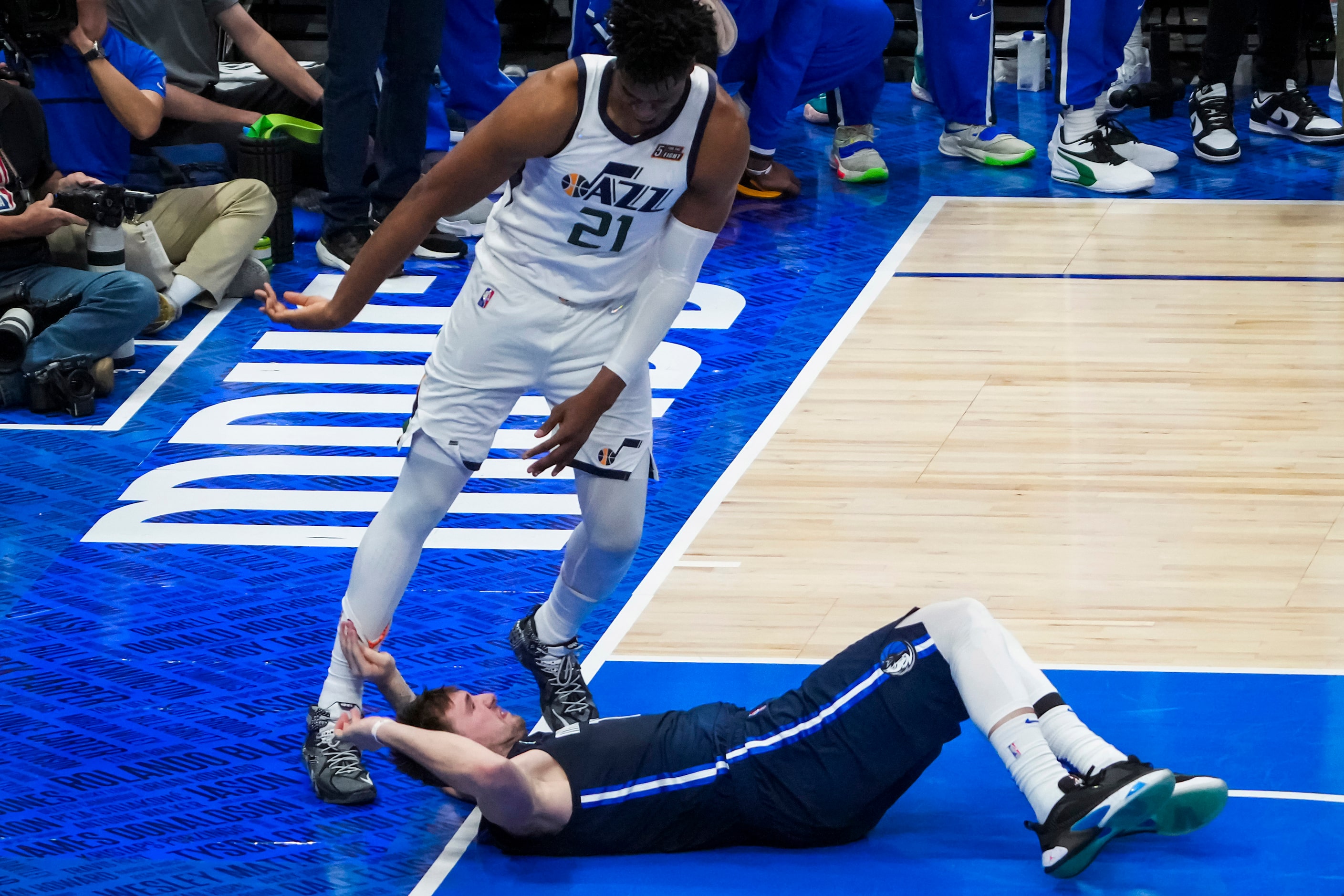 Dallas Mavericks guard Luka Doncic (77) hit the floor after being fouled by Utah Jazz center...