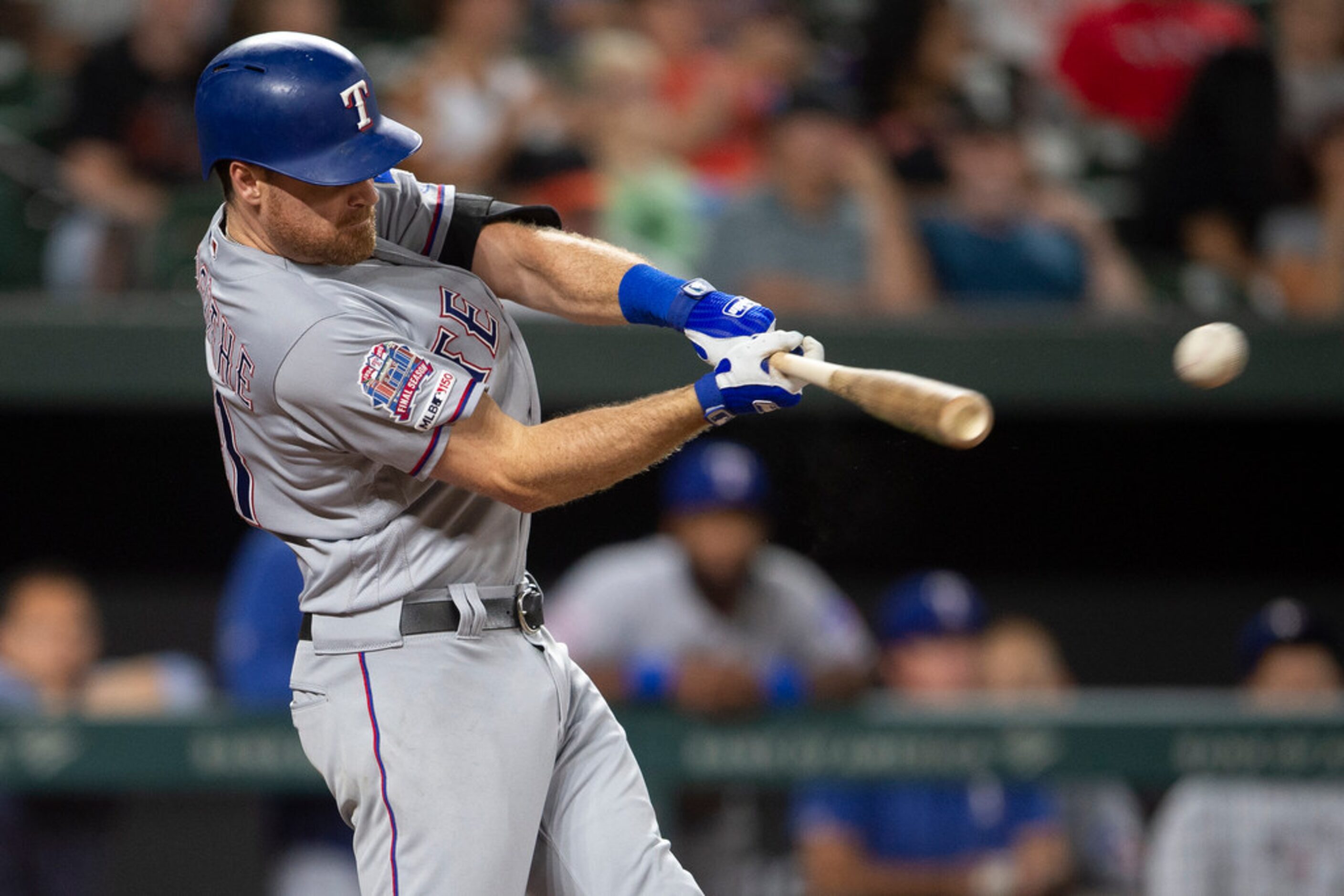 Texas Rangers' Logan Forsythe hits a double during the seventh inning of the team's baseball...