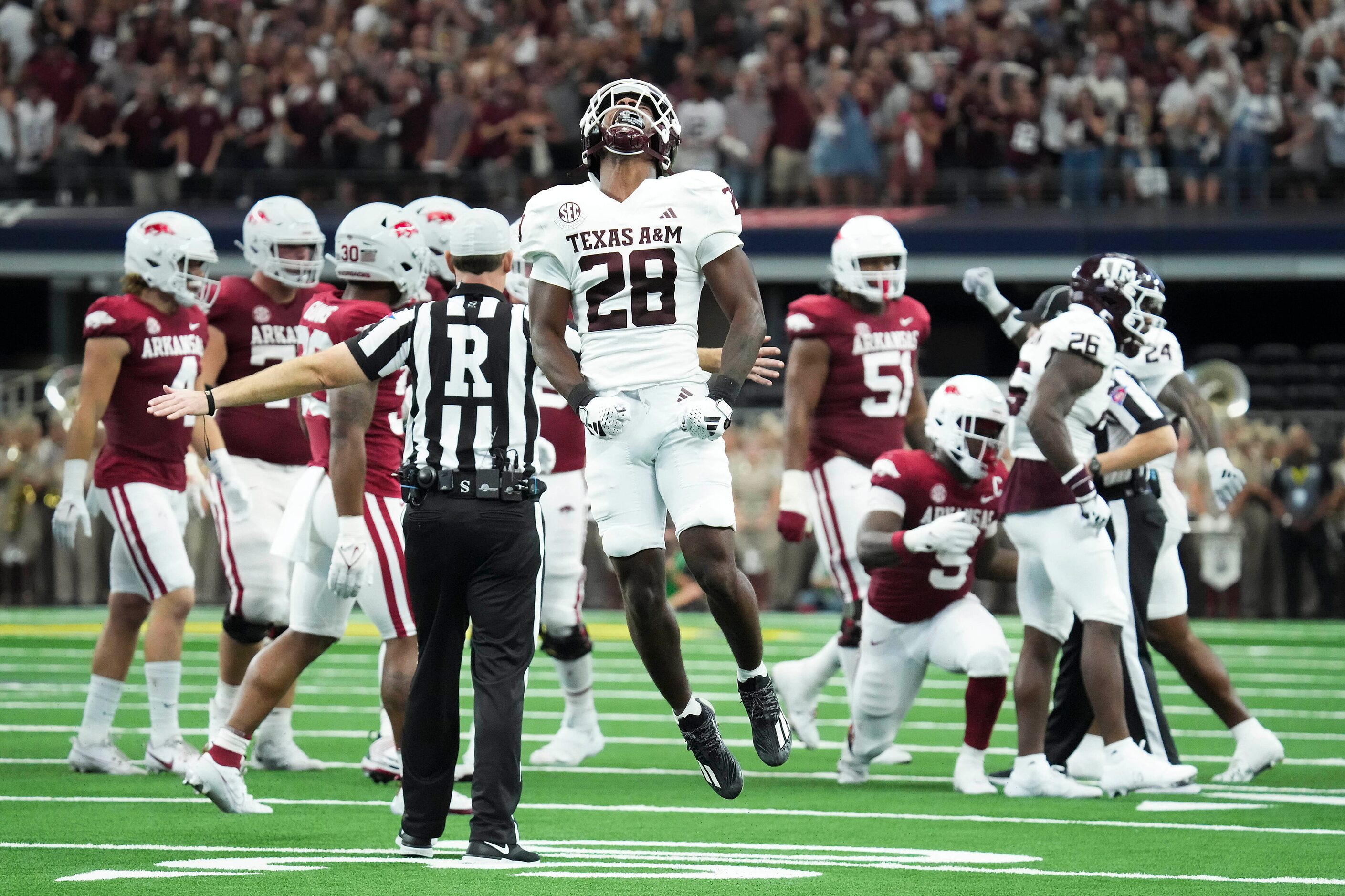 Texas A&M defensive back Josh DeBerry (28) celebrates after Arkansas running back Raheim...