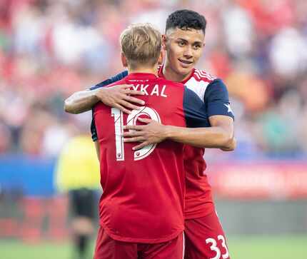 DALLAS, TX - JUNE 22: Paxton Pomykal and Edwin Cerrillo celebrate during the MLS soccer game...