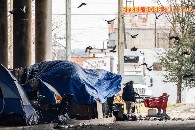 A campsite under I-45 Hwy where people experiencing homelessness live in Dallas on...