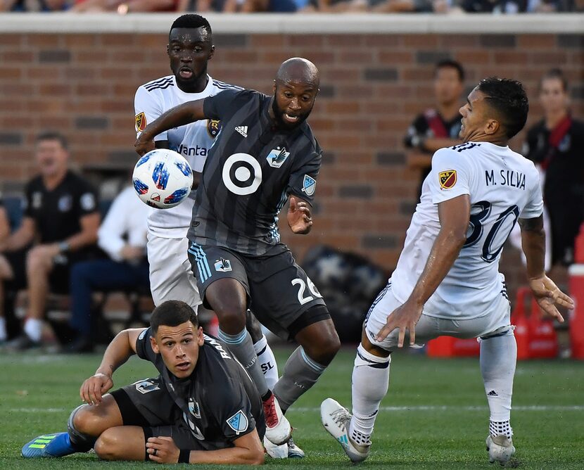 Minnesota United midfielder Collen Warner (26) and Real Salt Lake defender Marcelo Silva...