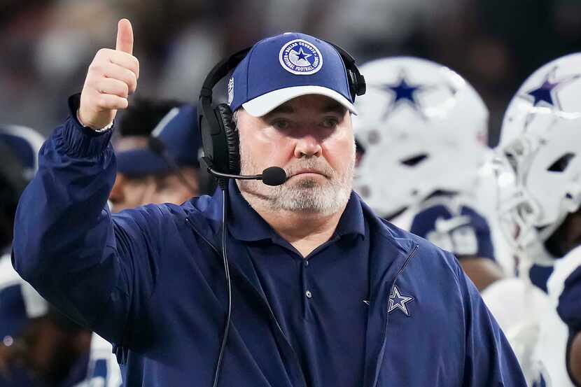 Dallas Cowboys head coach Mike McCarthy gives a thumbs up on the sidelines during the first...