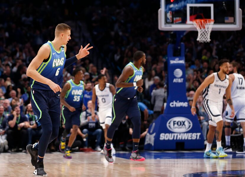 Dallas Mavericks forward Kristaps Porzingis (6) celebrates after a made three pointer in a...