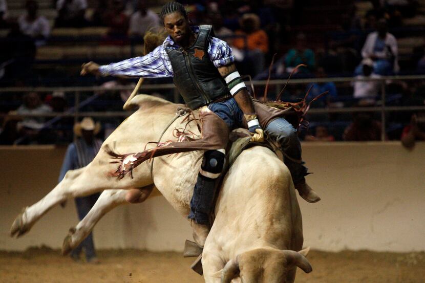 Bull rider Kendrick Mack competes in the bull riding competition at the 26th Annual Texas...