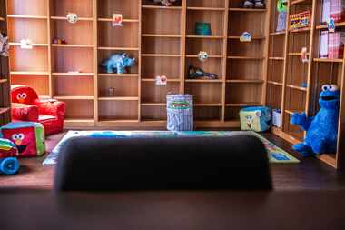 A Sesame Street-themed play room in the Dallas County Public Defender's office at the Frank...