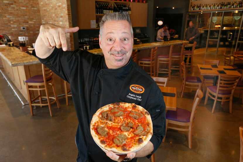 Chef Angelo Landi shows off his favorite Personal Pie pizza, the Spicey Meatball, offered...