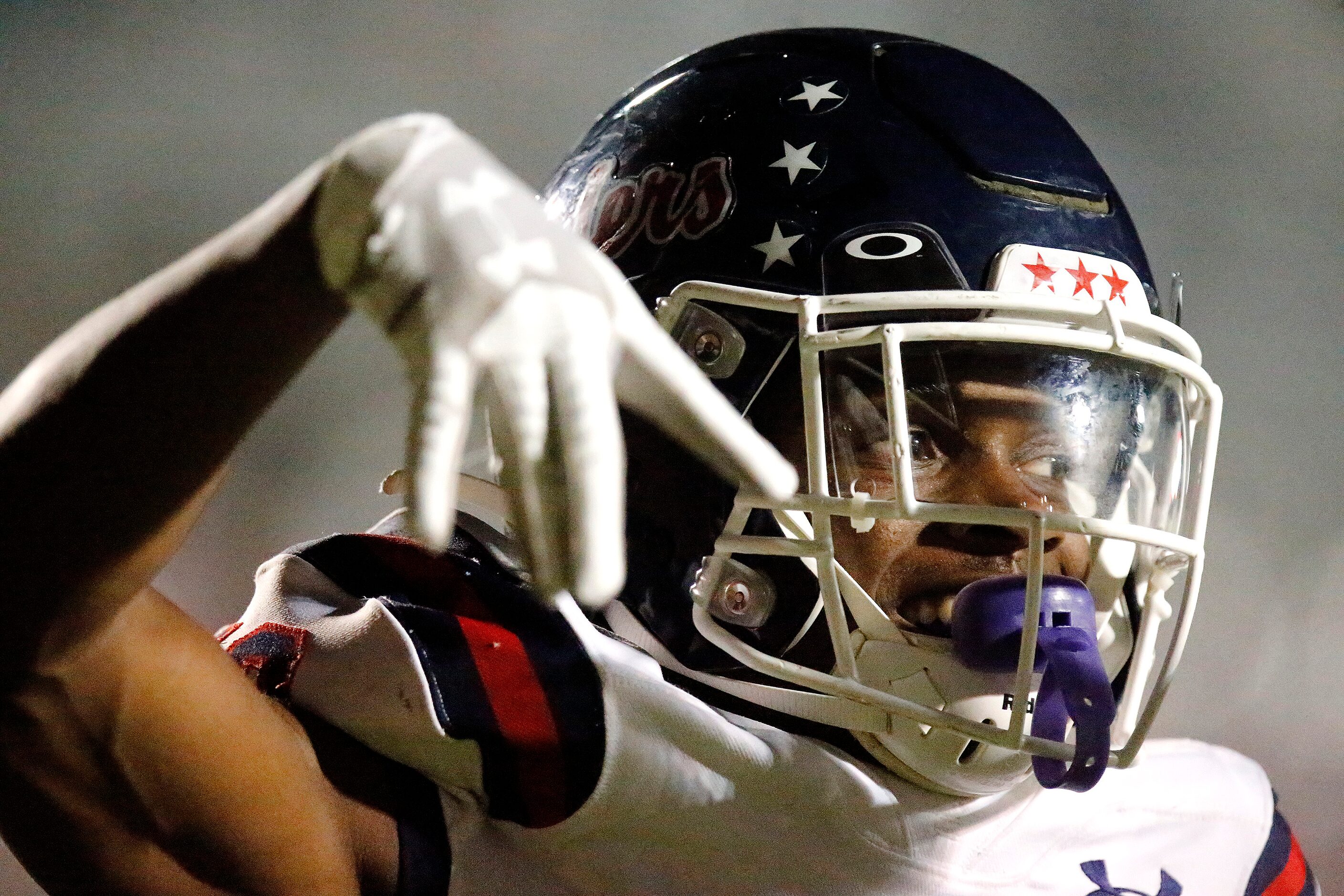 Denton Ryan High School wide receiver Antonio Thomas (10) was all smiles after a touchdown...