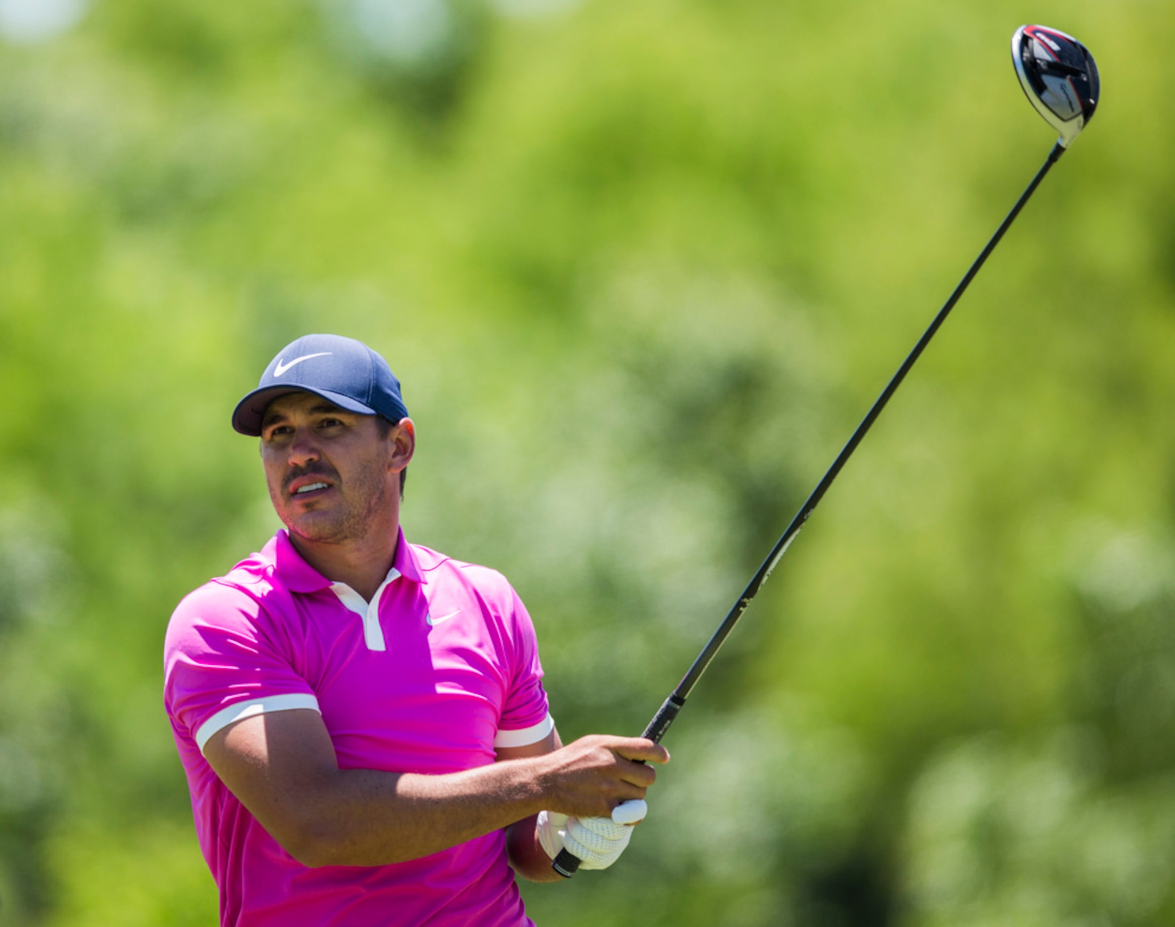 Brooks Koepka tees off a hole 4 during round 4 of the AT&T Byron Nelson golf tournament on...