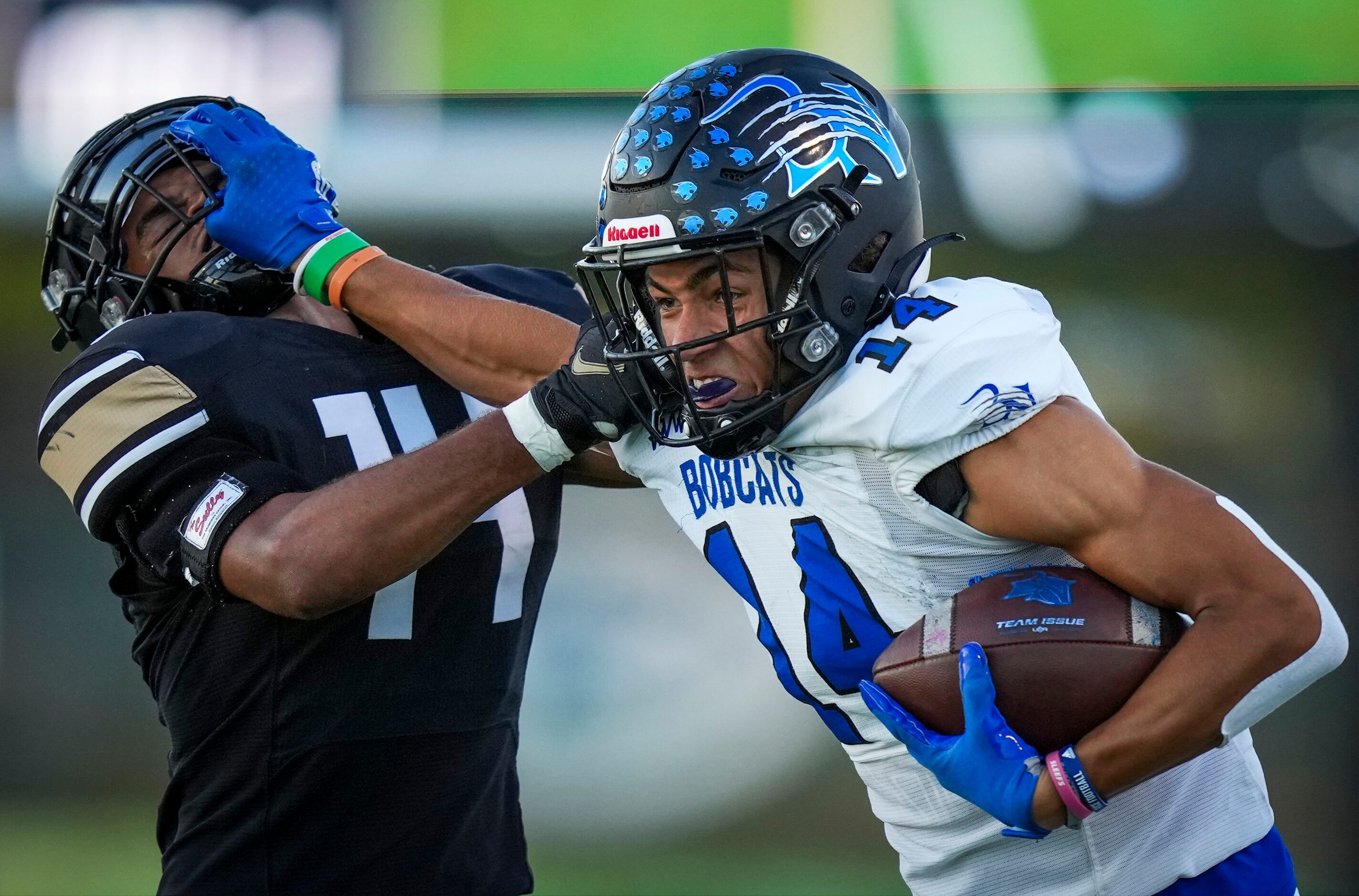 Trophy Club Byron Nelson wide receiver Landon Ransom-Goelz (14) pushes away from Keller...