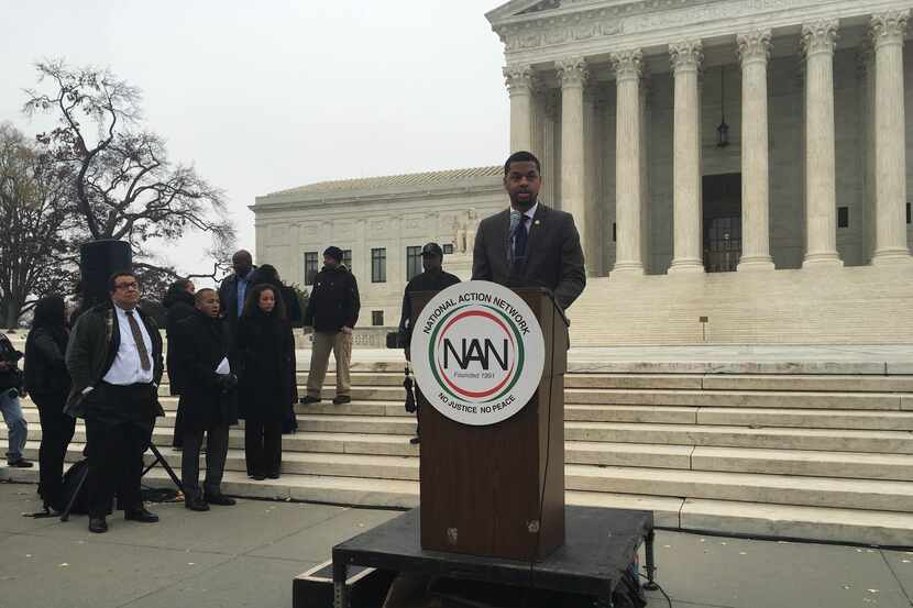  David McDonald, a senior at UT Austin, addresses affirmative action supporters outside the...