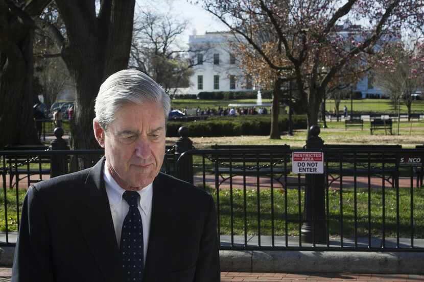 Special Counsel Robert Mueller walks past the White House after attending services Sunday at...