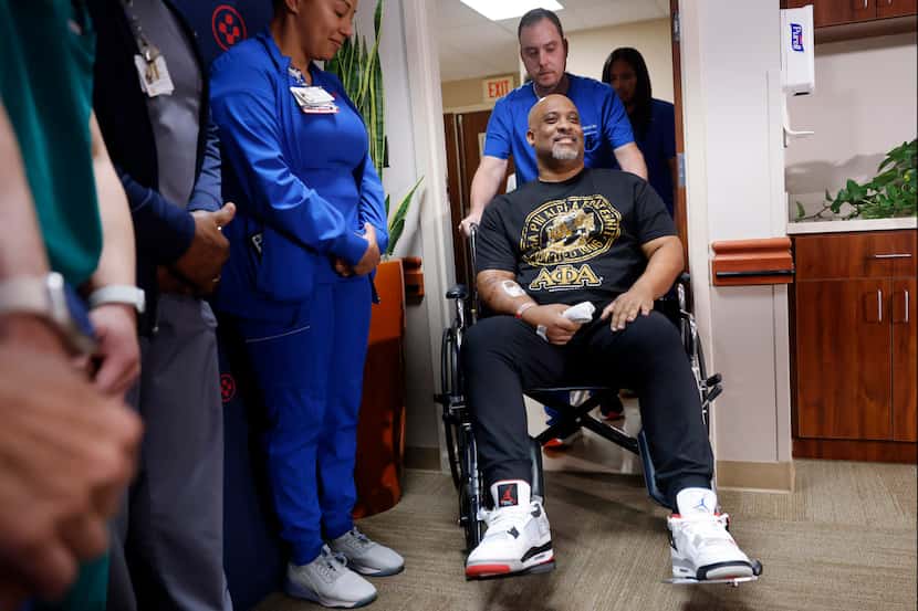 Patient Irvin Walker arrives in a wheelchair to speak of the day he was shot in his vehicle...