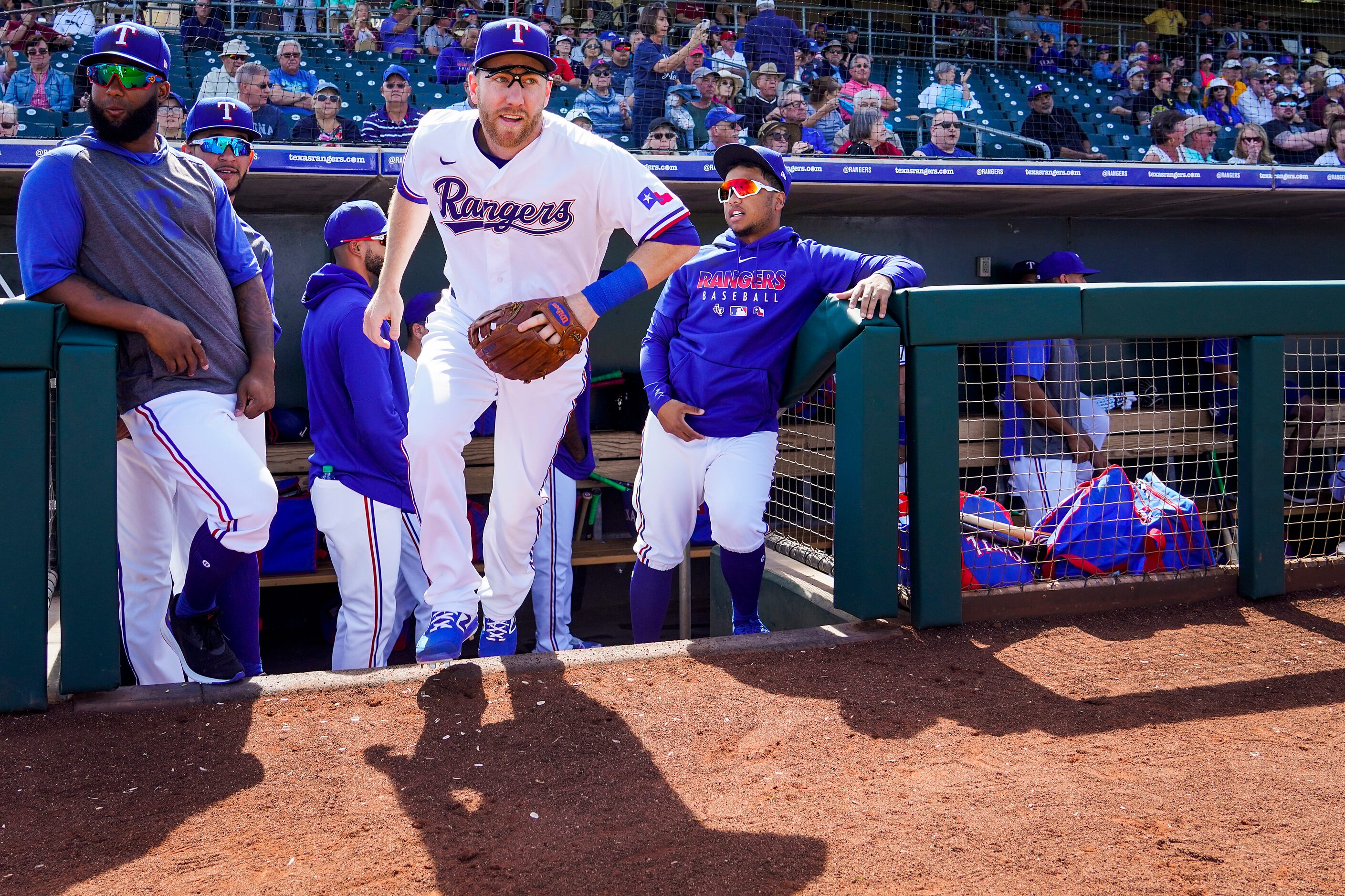 Texas Rangers third baseman Todd Frazier takes the field for a spring training game against...