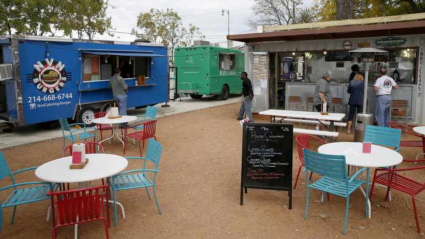 
Patrons order their food and drinks at the Richardson Food Truck Park on Saturday. 
