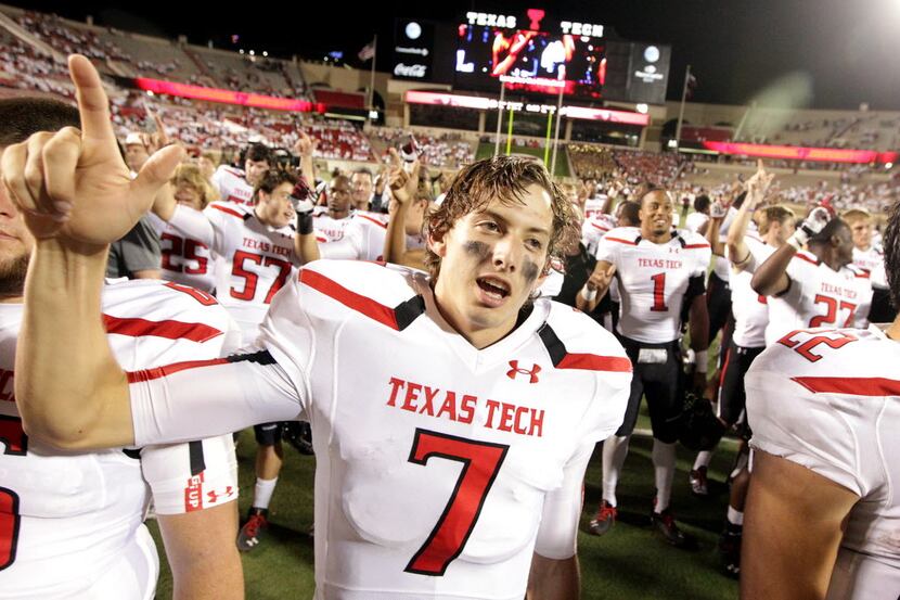 FILE - In this Sept. 21, 2013 file photo, Texas Tech's Davis Webb (7) celebrates a win over...