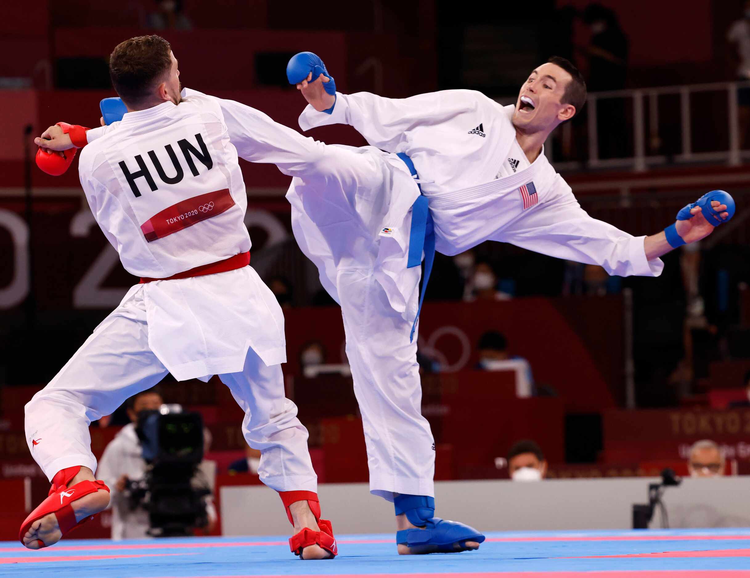 USA’s Tom Scott competes against Hungary’s Karoly Gabor Harspataki during the karate men’s...