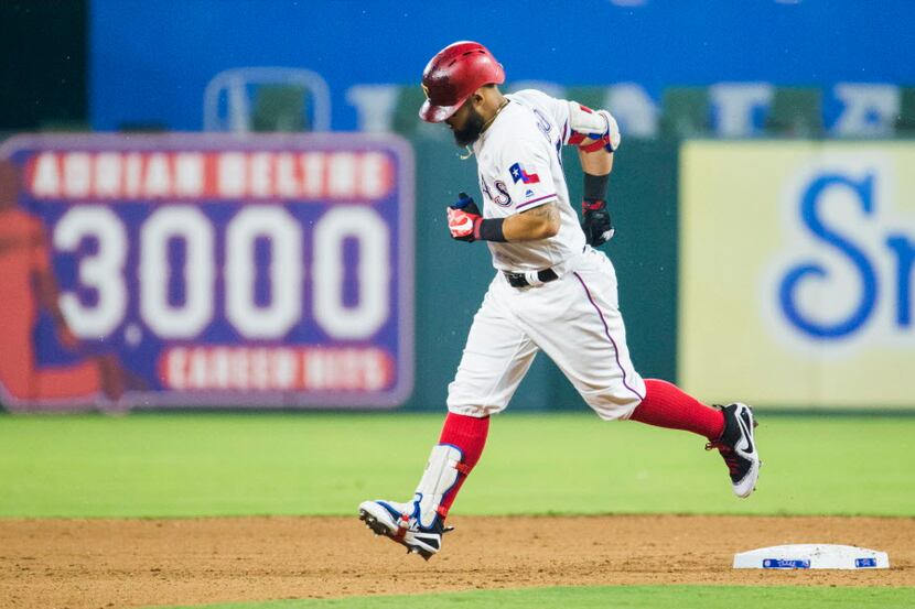 Texas Rangers second baseman Rougned Odor (12) rounds second base after hitting a home run...