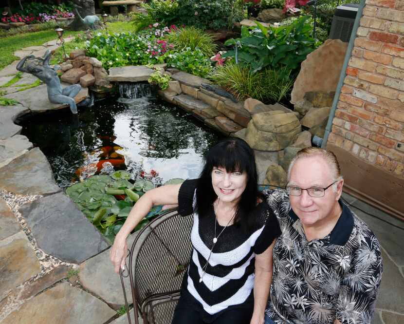 Kimberly and Ed Atchley have a pond in the back yard of their Richardson home.