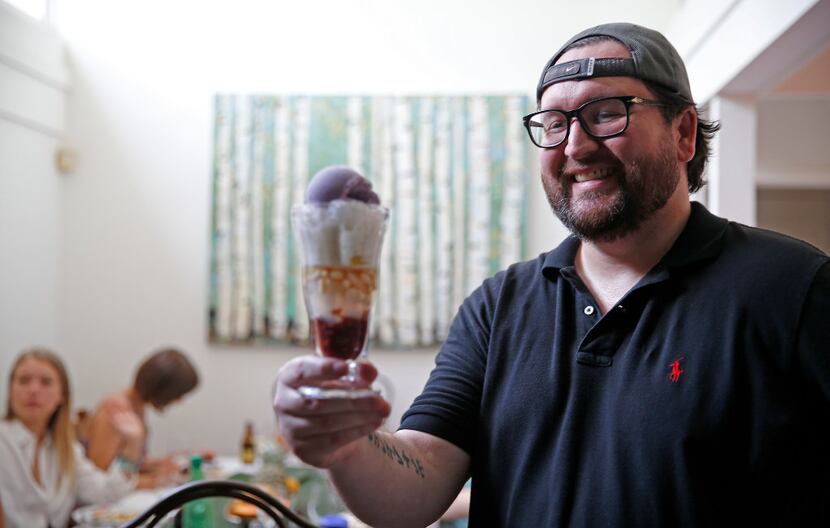 Sweet ending: Steve Smith holds a Halo-Halo desert at Tina Danze's Filipino potluck party. 