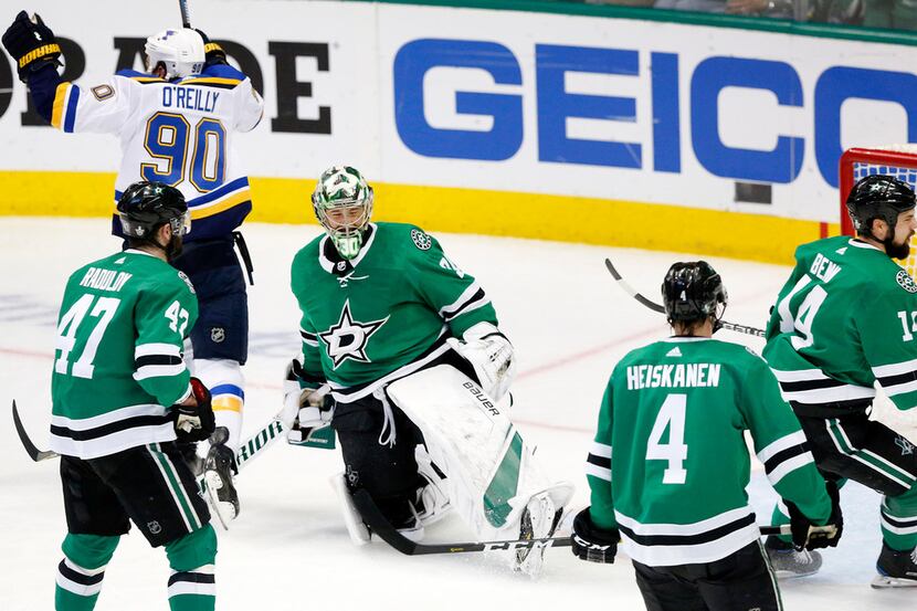 Dallas Stars goaltender Ben Bishop (30) reacts after giving up another goal to the St. Louis...