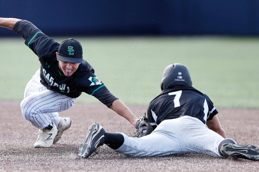 Southlake Carroll's Jake Murphy (1) tags Arlington Martin's Chet Lytle (7) on an attempt to...