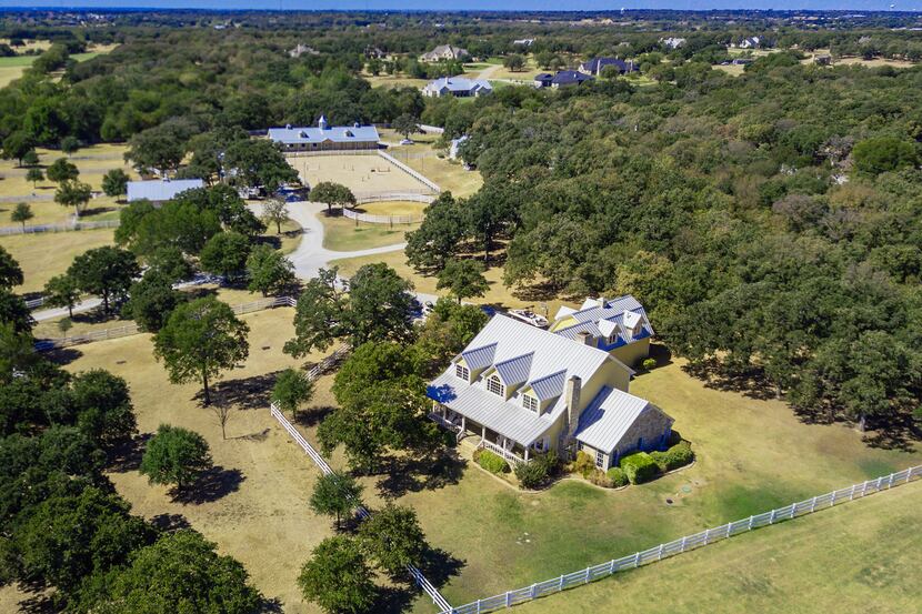 The 20-acre equestrian ranch at 1310 Gibbons Road in Bartonville will auction without...