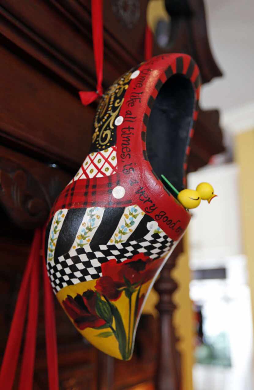 A wooden shoe in the collection of Sheri Geisler of Double Oak, handpainted by her sister.