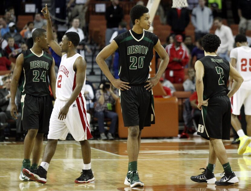 Galena Park North Shore player Brandon Etienne (2) celebrates as  Desoto guard Cedric Carson...