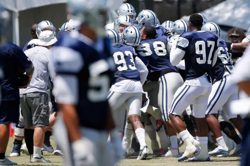 Dallas Cowboys defensive end Tyrone Crawford (98) and others get into a scuffle during the...