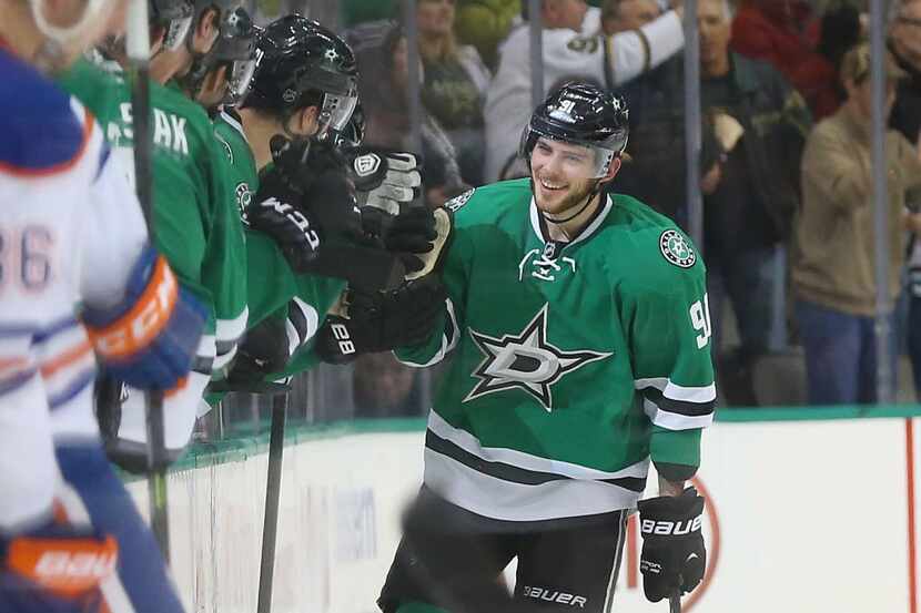 DALLAS, TX - NOVEMBER 25:  Tyler Seguin #91 of the Dallas Stars celebrates his goal against...