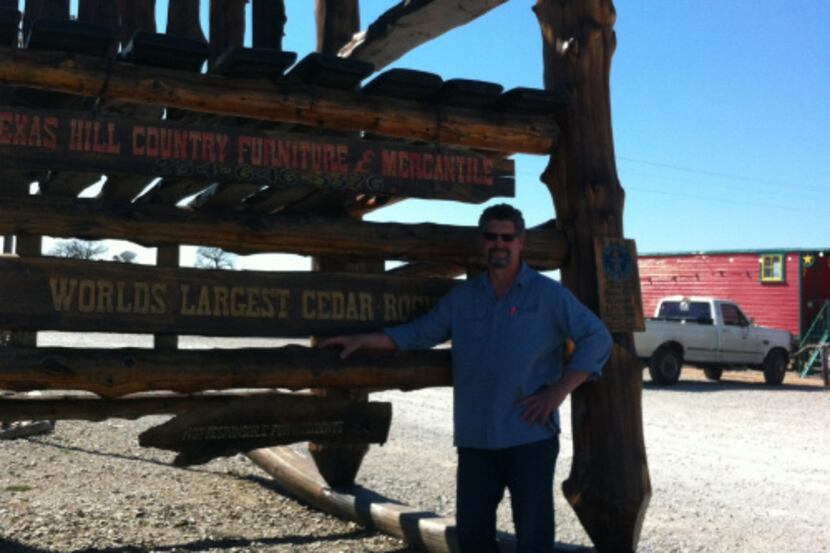 The world's largest cedar rocking chair sits in front of Natty Flat Smokehouse and Texas...